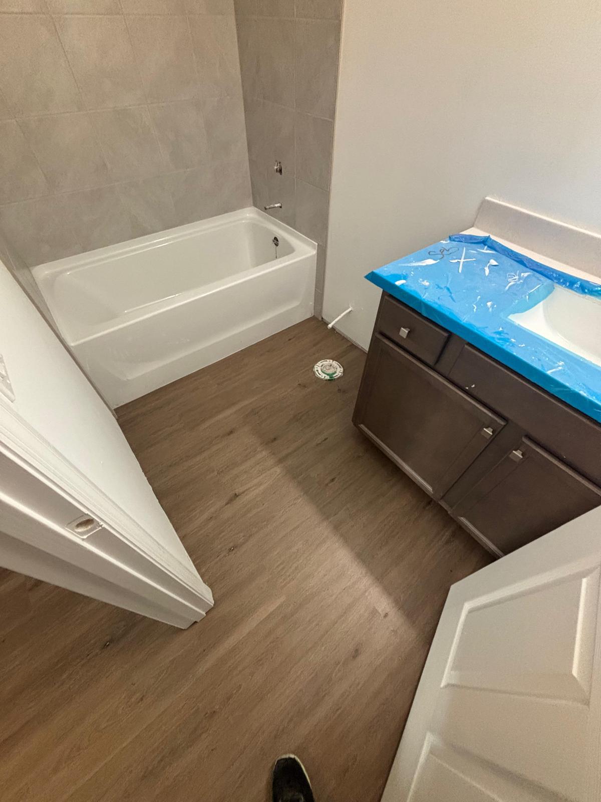 Pet-friendly vinyl plank flooring solution installed in busy Palm Bay household”